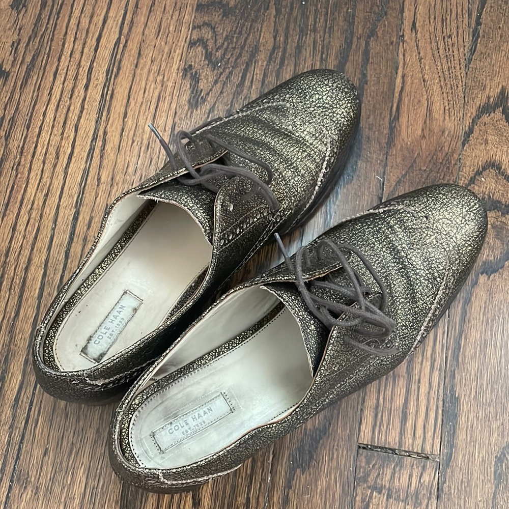 Lightly worn gold/brown Cole Haan women’s oxfords size 9.5